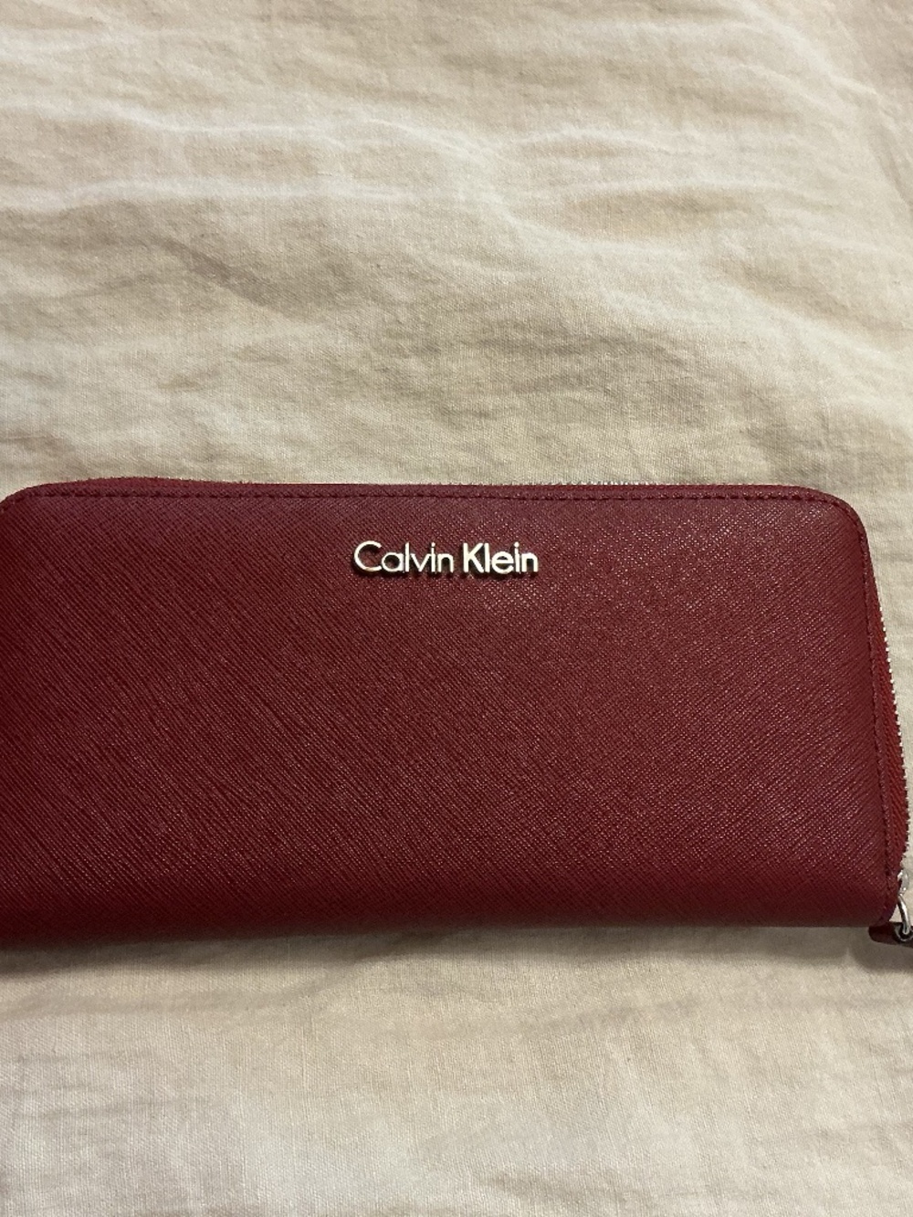 Calvin Klein Burgundy Saffiano Zip-Around Wallet – 12 Card Slots
